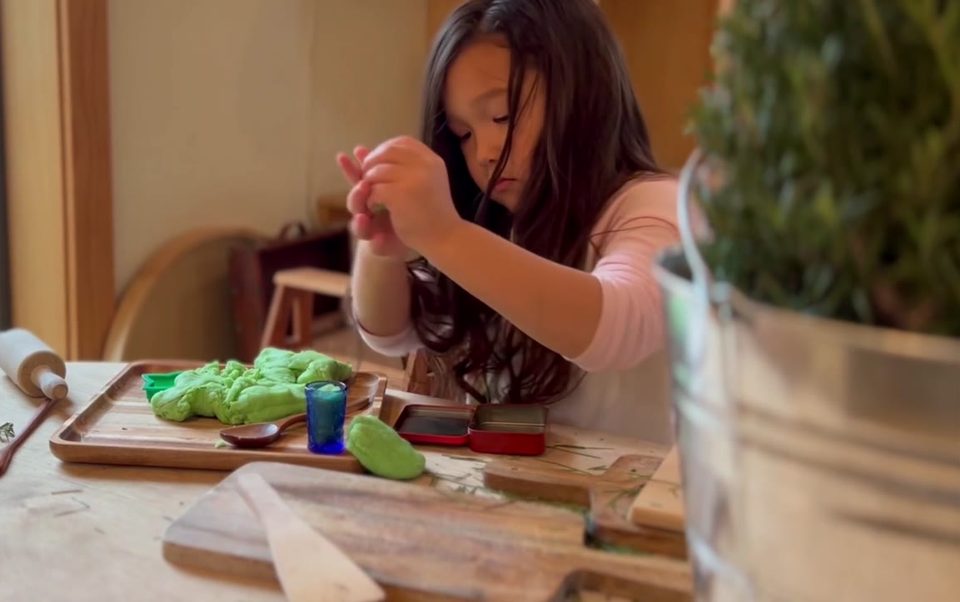 Sam at the playdough table